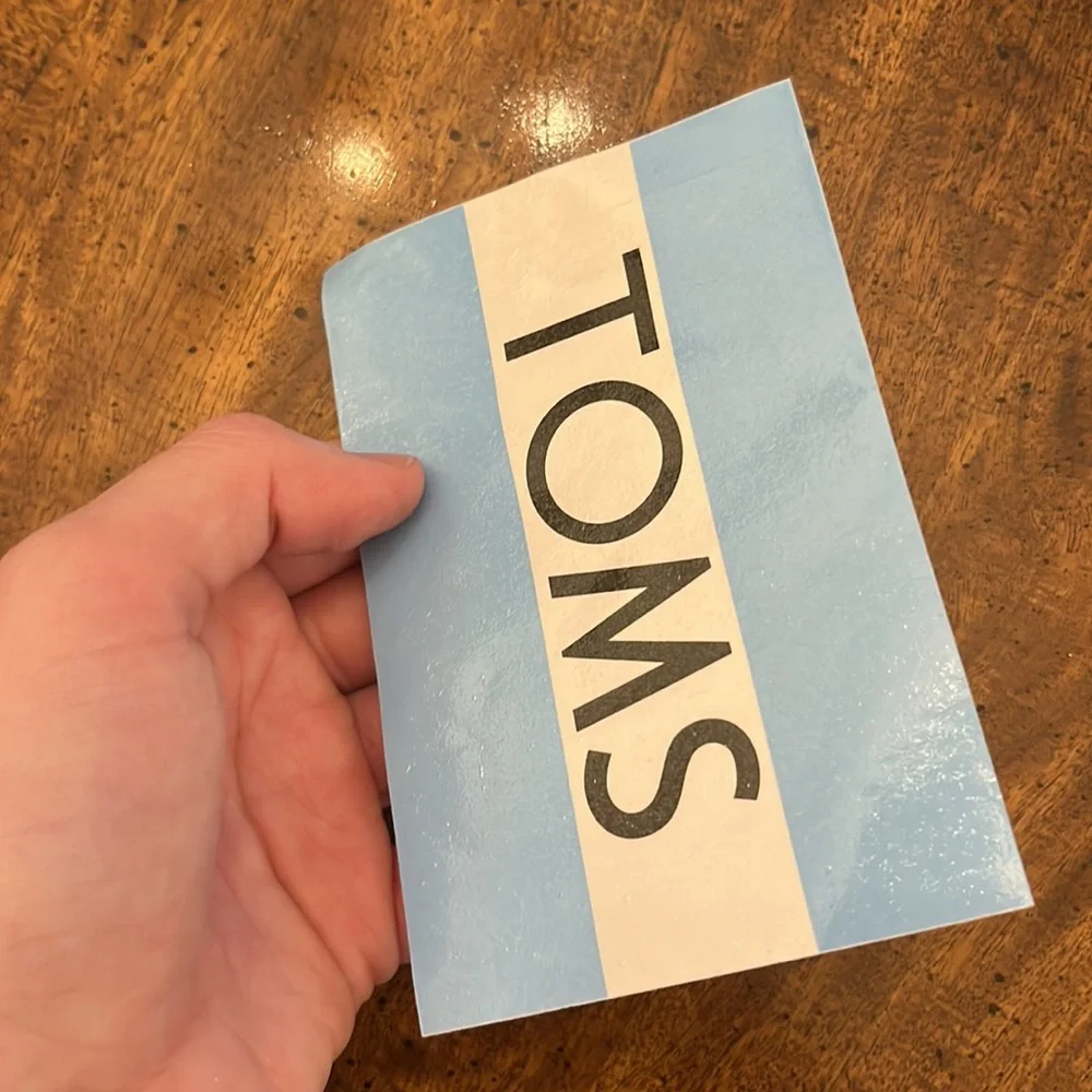 NWT TOMS Dust Cover Bag and Sticker